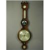Image 1 : A George III mahogany wheel barometer, with a hygrograph, thermometer, circular mirror and sil...