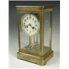 Image 1 : A late 19th Century brass four glass mantel clock, with a French striking drum movement, 29cm...
