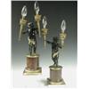 Image 1 : A pair of bronze figural candelabra, each in the form of a black patinated cherub holding two...
