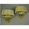 Image 1 : A pair of bronze twin branch wall lights with cast decoration, each with an oval shade Est....