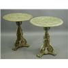Image 1 : A pair of Victorian style cast iron garden tables, the circular tops on triform supports and b...