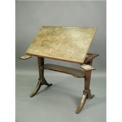 A Regency mahogany reading table with a sloping top with brass lined pin holes, a ratched supp...