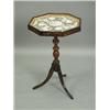 Image 1 : A Victorian rosewood tripod table, the octagonal top with a modern arrangement of shells, 48cm...
