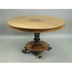 An early 19th Century mahogany veneered breakfast table, 122cm diameter Est. 400/600...