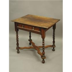 A William and Mary period oak side table, with a drawer on 4 twist and baluster turned legs, l...