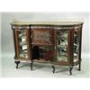 Image 1 : A late 19th Century display cabinet with brass gallery rail, above carved foliate frieze with...
