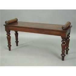 An early Victorian mahogany window seat, with end scrolls on turned legs, 92cm long Est. 50...