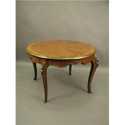 A late Victorian circular kingwood centre table, the top crossbanded and segmentally veneered, wi...