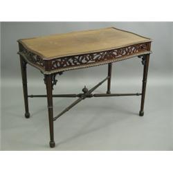 A late 19th Century mahogany centre table by Gillows, having a fretwork frieze with a gadroone...