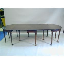 A Georgian style 'D' end mahogany dining table, with tapering legs and pad feet (part 18th Cen...