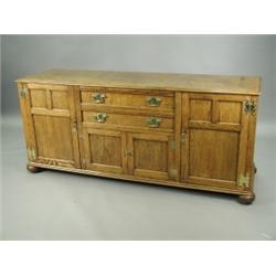 A early 20th Century reproduction dresser base, 79cm high, 178cm wide Est. 600/800...