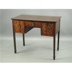 A 19th Century mahogany kneehole side table, with ebony stringing and three drawers, on square...