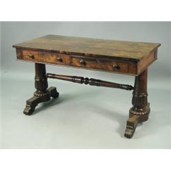 A Victorian rosewood centre table, with two frieze drawers, raised on tapering carved supports...
