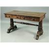 Image 1 : A Victorian rosewood centre table, with two frieze drawers, raised on tapering carved supports...