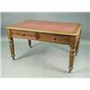 Image 1 : A Victorian mahogany library table, with a leather top, two frieze drawers on turned tapering...