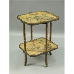 A Victorian 'Aesthetic' taste satinwood painted two tier occasional table, with pierced galler...