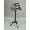 Image 1 : A George III mahogany music stand, the double sided adjustable top with lattice panels and hin...
