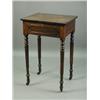 Image 1 : A mid 19th Century rosewood lamp table, with a single drawer, raised on turned and reeded legs...
