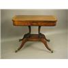 Image 1 : An early 19th Century mahogany tea table, the folding top with rosewood and satinwood cross ba...