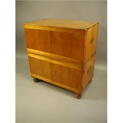 A 19th Century cedarwood campaign chest, in 2 parts with brass fittings, on turned feet 85cm w...