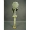 Image 1 : An unusual Irish marble pedestal lamp carved as an eagle supporting an alabaster globe shaped...