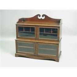 An Edwardian miniature inlaid mahogany display cabinet, the swan neck tray top over 2 pairs of...