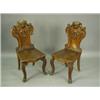 Image 1 : A pair of Victorian oak hall chairs the cartouche shaped back carved each with a lions head, c...