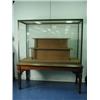 Image 1 : A large late Victorian mahogany display cabinet, with 2 end doors, on a stand with 4 octagonal...