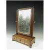 Image 1 : A George III walnut dressing mirror, the rectangular glass over a three drawer box base and og...