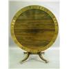 Image 2 : A Regency rosewood circular tilt top dining table, the crossbanded top with brass stringing an...