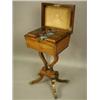 Image 2 : A Regency rosewood and brass inlaid teapoy, the lid of fielded form opening to reveal four lid...