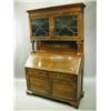 Image 1 : A rosewood bureau bookcase, the upper section with a pair of astragal glazed doors, the brass...