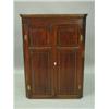 Image 1 : A George III mahogany hanging corner cabinet with two strung and panelled doors, 80cm wide ...