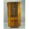 Image 1 : An Edwardian satinwood bookcase with two astragal glazed doors and shaped open shelves over tw...
