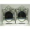 Image 1 : A pair of early 20th Century Venetian glass wall mirrors, of rectangular form, with an oval pl...