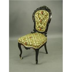 A Victorian ladies chair with a carved mahogany frame on scrolled front legs Est. 150/250...