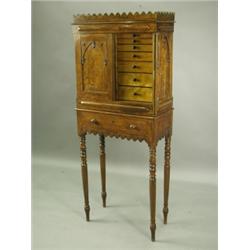 An early 19th Century narrow oak cabinet, with a three quarter gallery over a pair of gothic p...