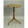 Image 1 : An early 19th Century mahogany tripod table, the cut corner rectangular top on a turned beechw...