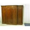 Image 1 : A Victorian mahogany breakfront wardrobe, the four panelled doors enclosing slides, drawers an...