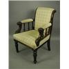 Image 1 : A Victorian walnut armchair, with an upholstered back, arms and seat, the arms with spindles a...