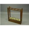 Image 1 : An oak umbrella stand with four divisions, 63cm wide Est. 80/120...