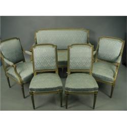 A late 19th Century continental gilt salon suite with carved decoration, turned and fluted leg...