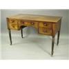 Image 1 : A George IV mahogany writing table, with five drawers, on turned and reeded legs, 122cm wide x...