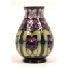 Image 1 : A Moorcroft Violet Pattern Vase, 14 cm  See illustration £70 - 100...