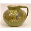 Image 1 : A C H Brannam Studio Jug, decorated fish and seaweed on a green ground dated 1896 (a.f.), 23 cm...