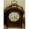 Image 1 : An Edwardian Dome Top Mantle Clock, in an inlaid mahogany case £50 - 80...