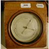 Image 1 : A Negretti & Zambra Brass Barometer, 12 cm, and a glazed oak box, 17 cm £60 - 100...