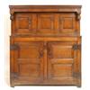 Image 1 : An Early 18th Century Joined Oak Court Cupboard, the moulded cornice a frieze carved RI 1725 abov...