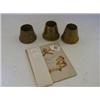 Image 1 : THREE TRENCH ART TAPERED VESSELS, applied insignia and a 1918 Machine Gun Corps booklet (4)  20-3...