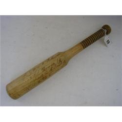 AN ASH TRUNCHEON, with Derby related ink inscription dated '1850', length 37cm  30-40...